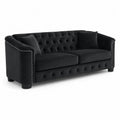 Sof¨¢ de terciopelo negro con tachuelas 22