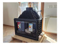 Insert bois 18kW fonte epaisse sortie superieure air primaire reglable